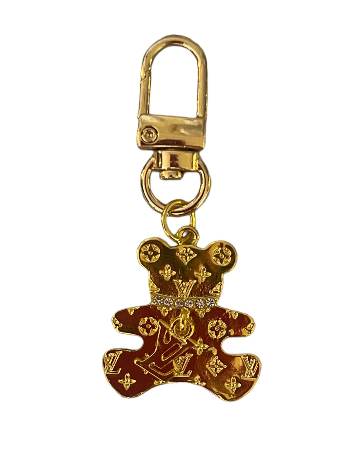 Gold bear charm attached to dog collar clip