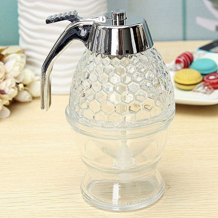 Honey syrup dispenser on kitchen counter