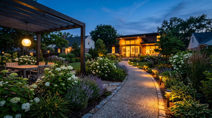 Solar pathway lights glowing at dusk in a modern garden