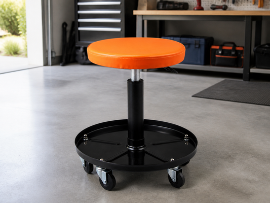 Orange adjustable mechanic rolling seat with tool tray in a tidy garage