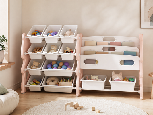Pink and white toy storage organizer with twelve bins and book shelves in a sunlit playroom