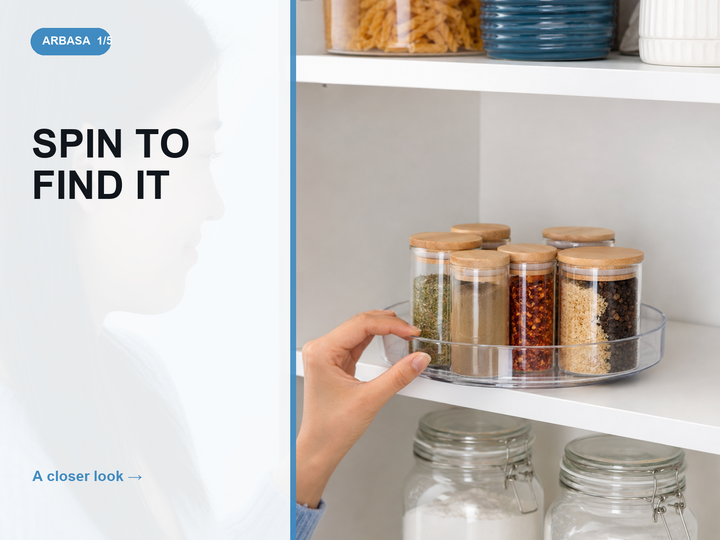 Rotating spice rack turntables organizing jars inside a bright kitchen cabinet