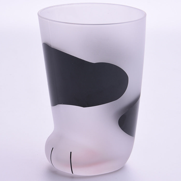 Cow print cat paw frosted glass mug, front view