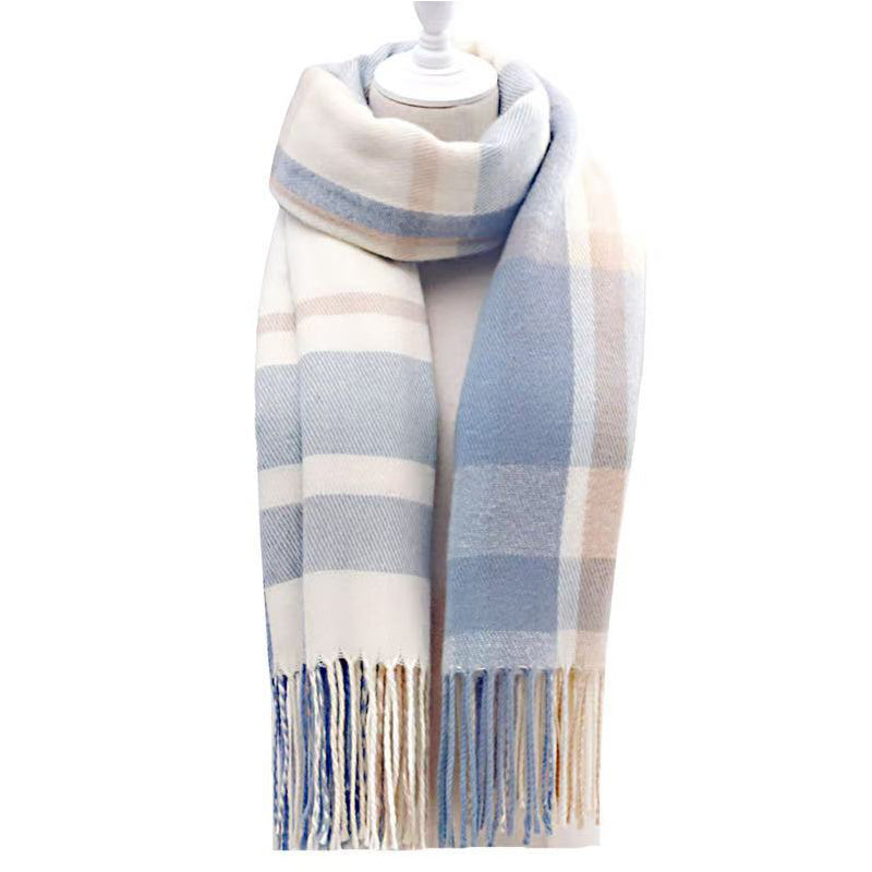 Blue plaid tassel scarf hanging, close-up of the pattern