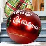 Red giant inflatable Merry Christmas ornament ball on front steps