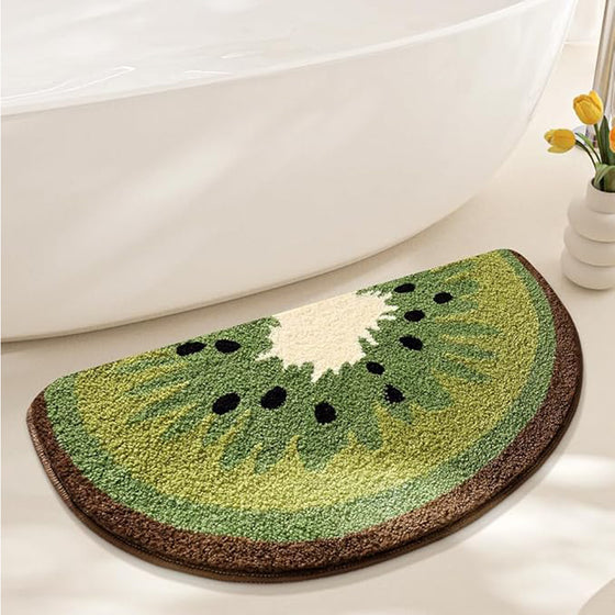 Kiwi bath mat beside a white bathtub