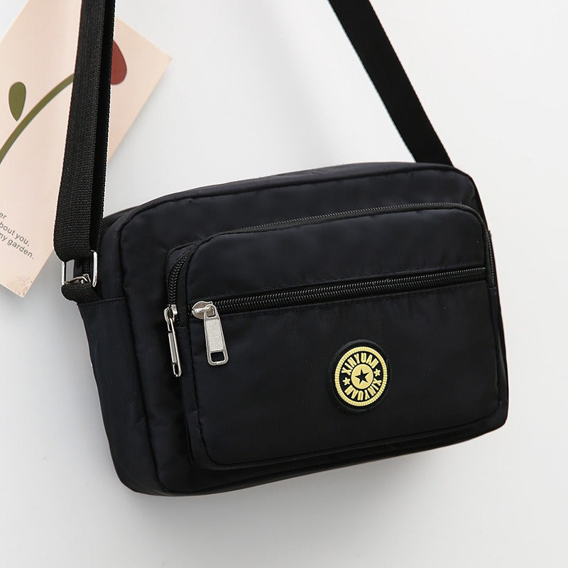 Small printed nylon crossbody bag with zipper, photo 6