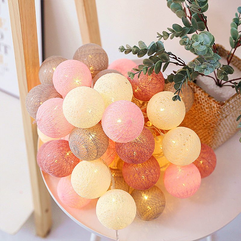LED cotton thread lanterns, draped on headboard