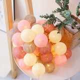 LED cotton thread lanterns, draped on headboard