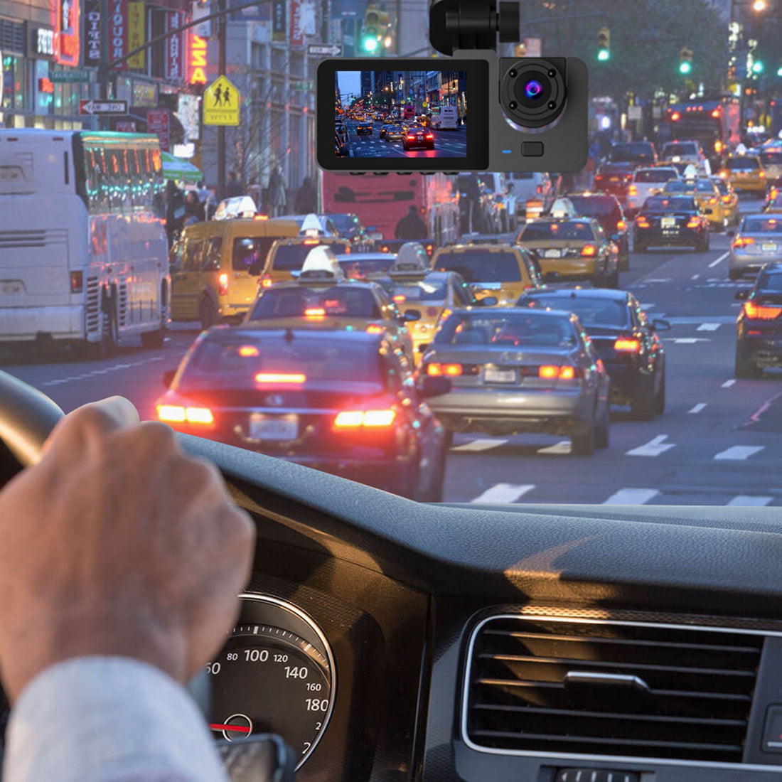 Dash cam recording city traffic from a car windshield