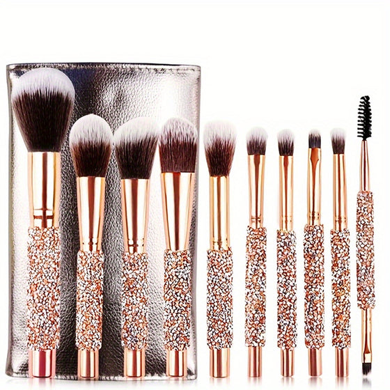 10 rose gold rhinestone makeup brushes in front of a metallic pouch