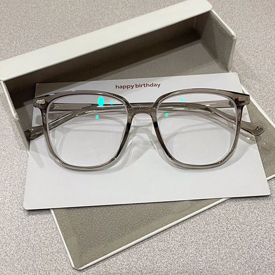 Blue light blocking glasses front view with oversized clear lens frame