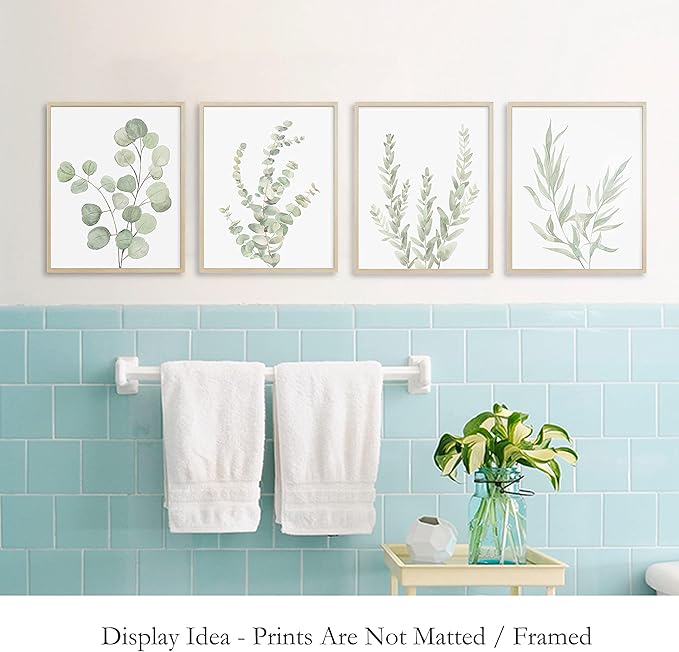 Four botanical canvas panels laid out flat