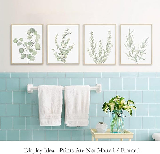 Four botanical canvas panels laid out flat