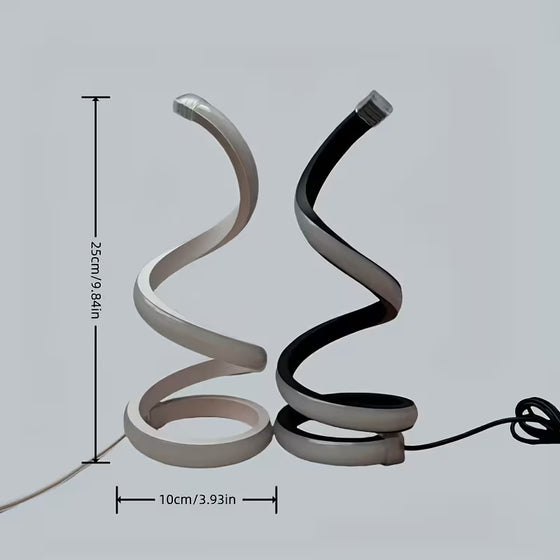 Silver and black spiral lamps with 25 cm height and 10 cm base dimensions