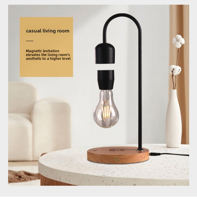 Magnetic levitating LED light bulb floating above a black base, photo 1
