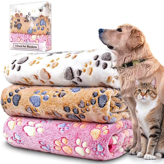 Three paw print fleece pet blankets with a golden retriever, a cat and the gift box