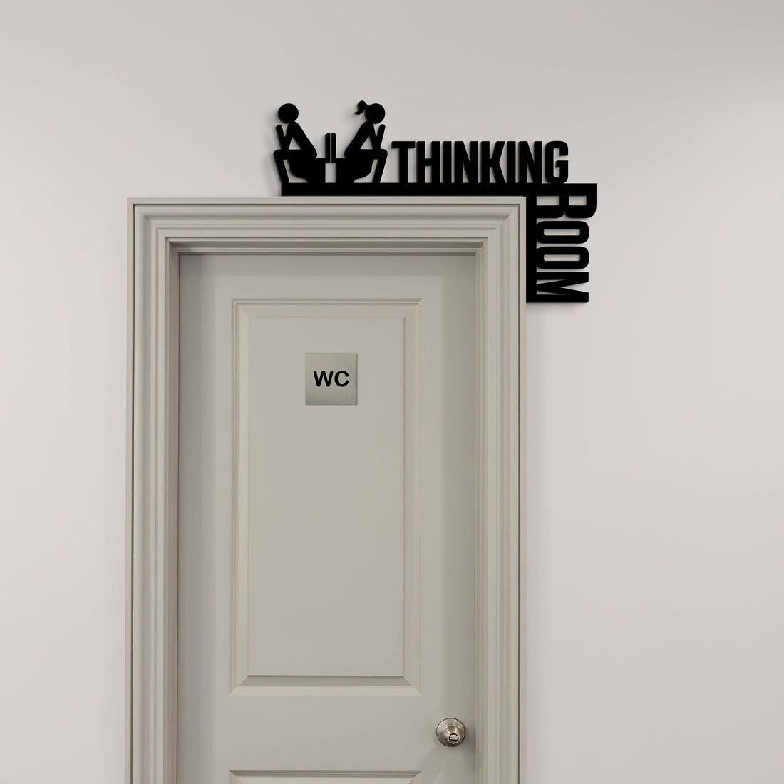 Thinking Room sign above a WC door in a grey hallway