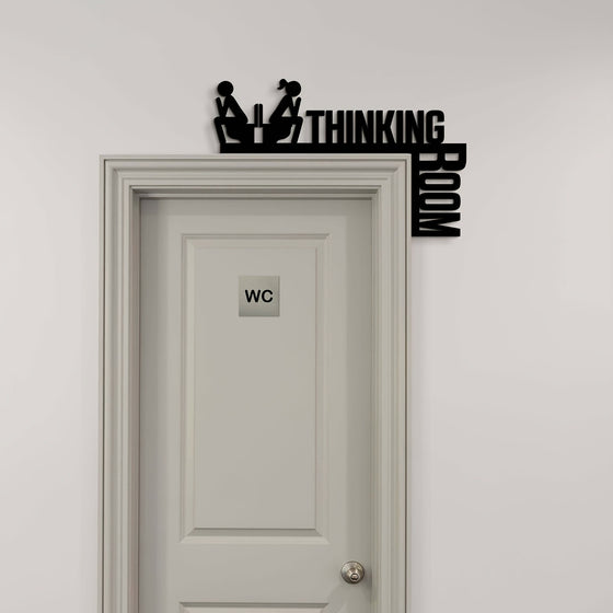 Thinking Room sign above a WC door in a grey hallway