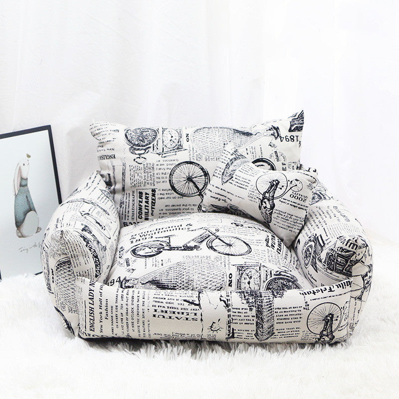 Armchair-style pet bed shown from the front with cushioned seat