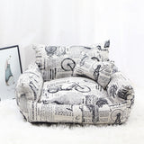 Armchair-style pet bed shown from the front with cushioned seat