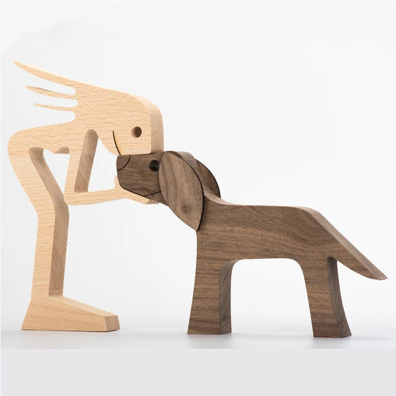 Wood carving of a man standing with his dog, walnut finish