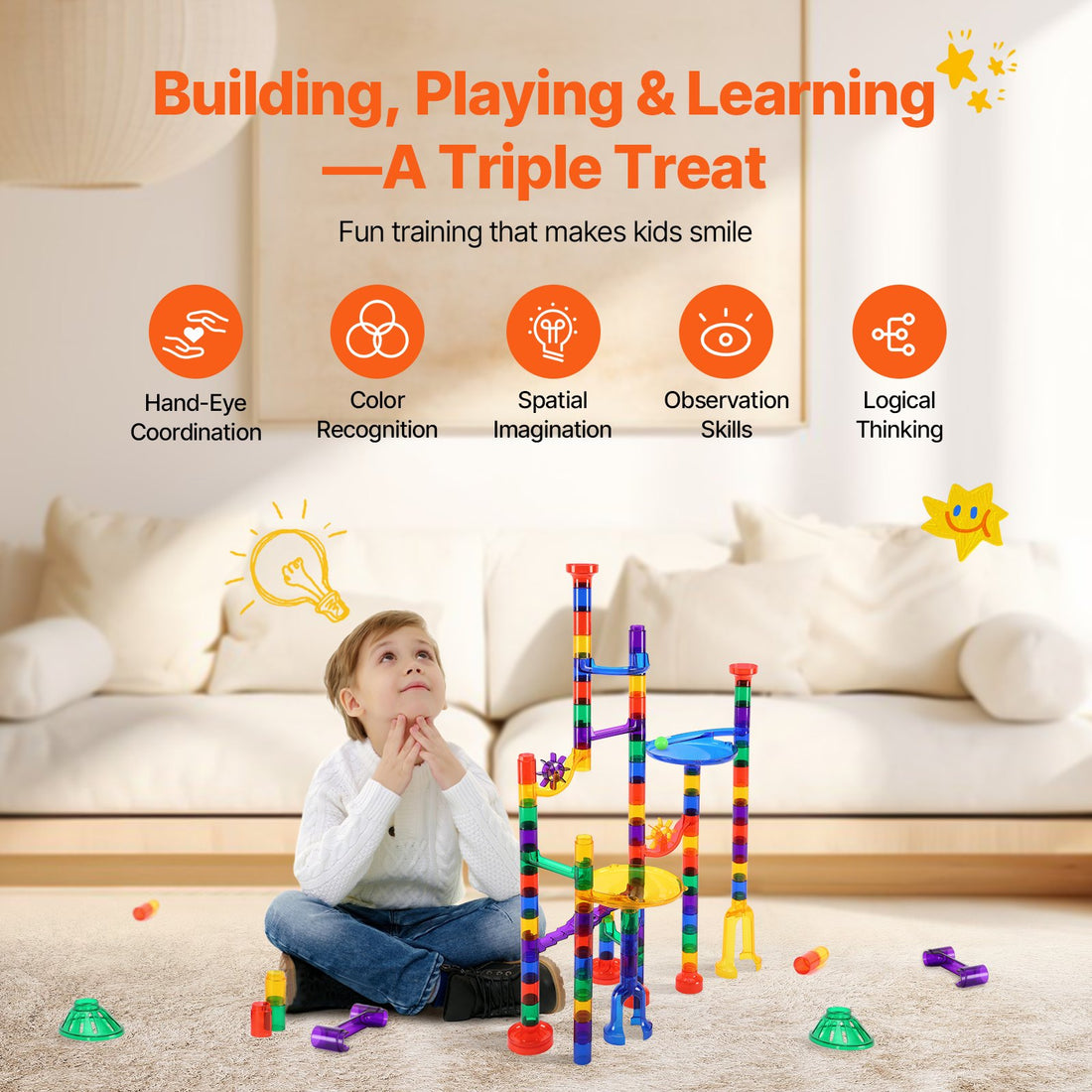 Boy watching a tall colorful marble run tower in a living room