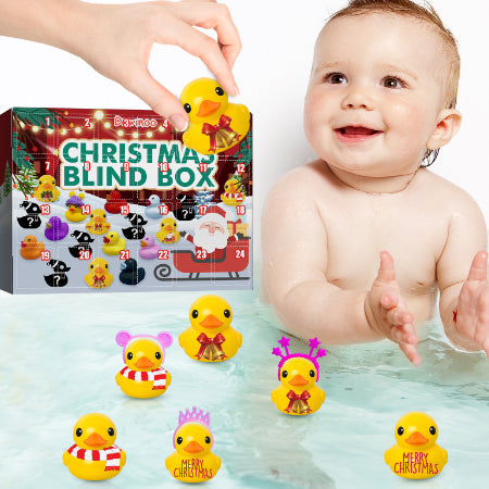 Christmas rubber ducks floating in water next to the advent calendar box
