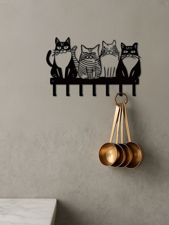 Cat wall hook rack holding measuring cups