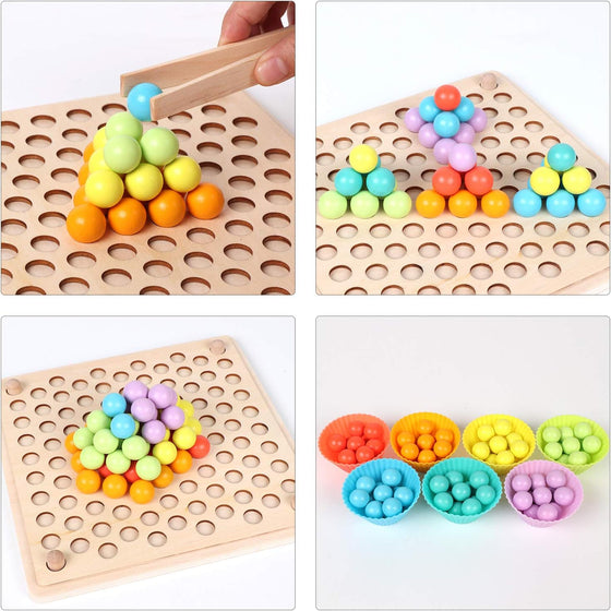 Hand using wooden tweezers to place beads on the peg board, beads sorted in cups