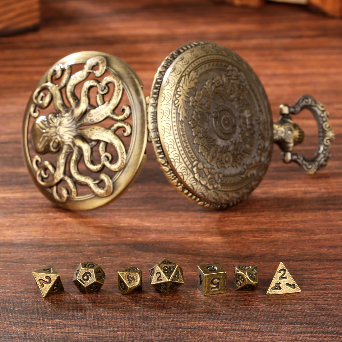 Bronze octopus pocket watch dice case front and back on a wood table