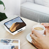 Wireless power bank with phone charging on pad
