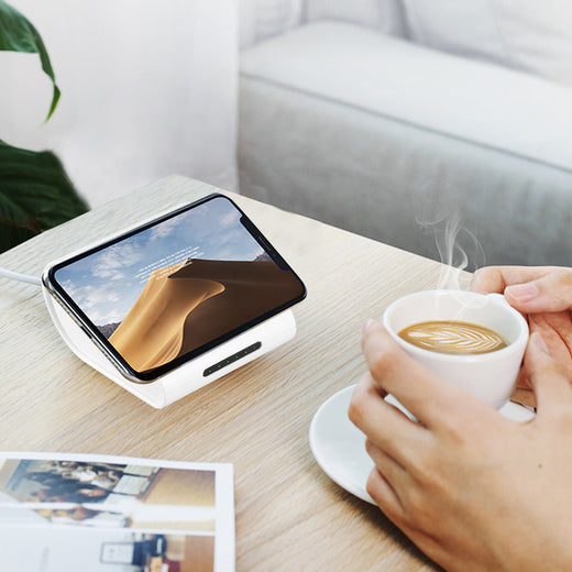 Wireless power bank with phone charging on pad