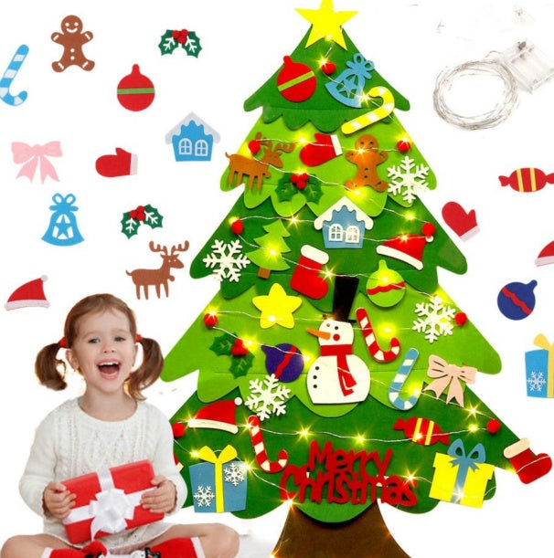 Girl decorating a DIY felt Christmas wall tree with detachable felt ornaments