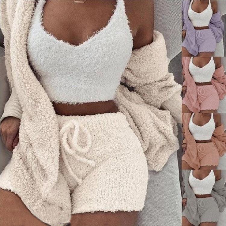 Women's 3-piece fleece pajama set in cream white: hooded crop top, white tank top and drawstring shorts, with color options