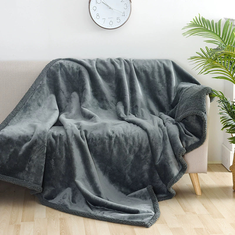 Reversible flannel and sherpa pet blanket on a sofa, photo 4