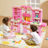 Kids play kitchen sink and fridge stations close up