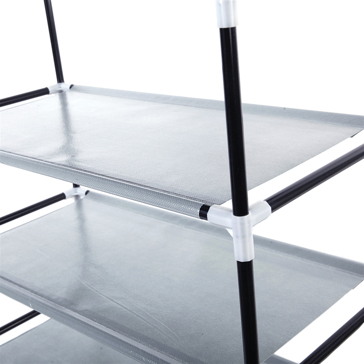 Angled view of narrow shoe rack full height