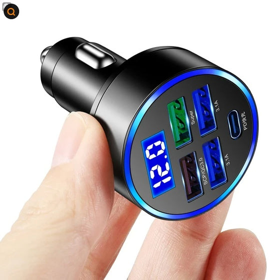 Hand holding the 5-port car charger with blue display
