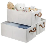 Foldable clothes storage box open with bedding inside