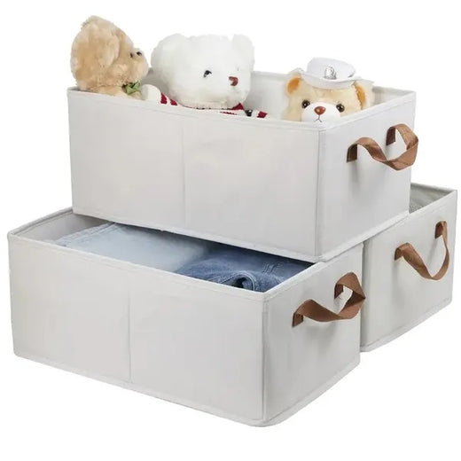 Foldable clothes storage box open with bedding inside