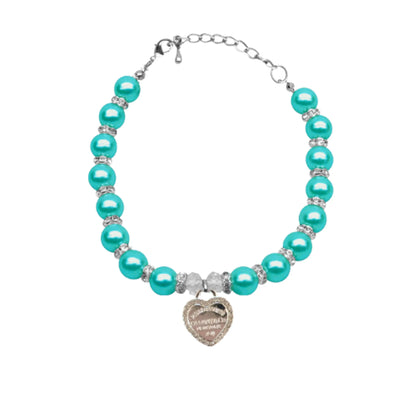 Dog wearing the Single Row Pearl necklace, front