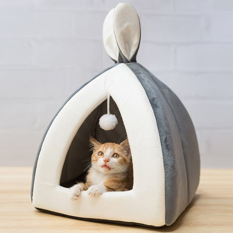 Bunny-shaped pet house with the ear-flap entrance visible