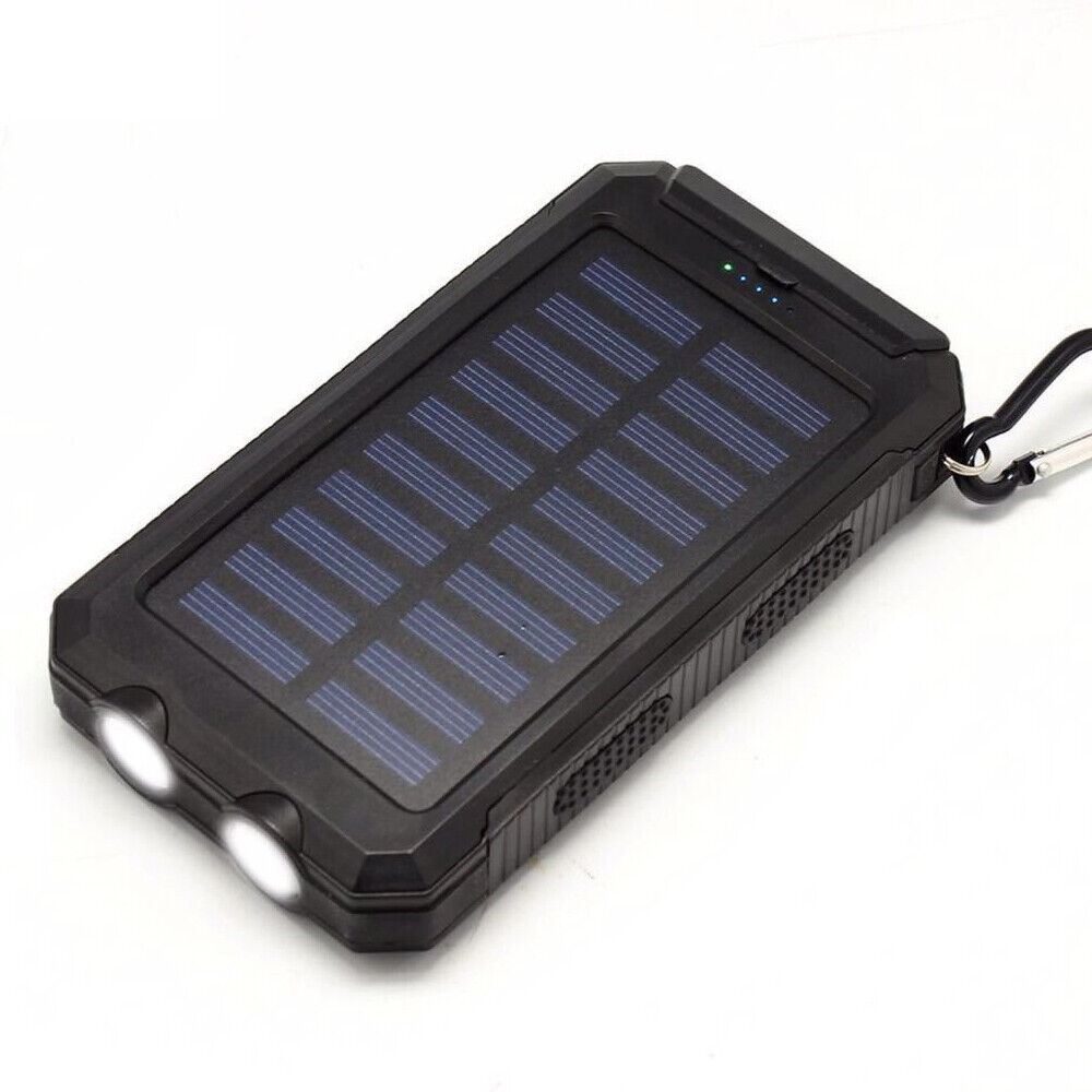 Solar power bank charging a phone via USB cable