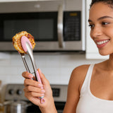 Stainless steel kitchen tongs side view