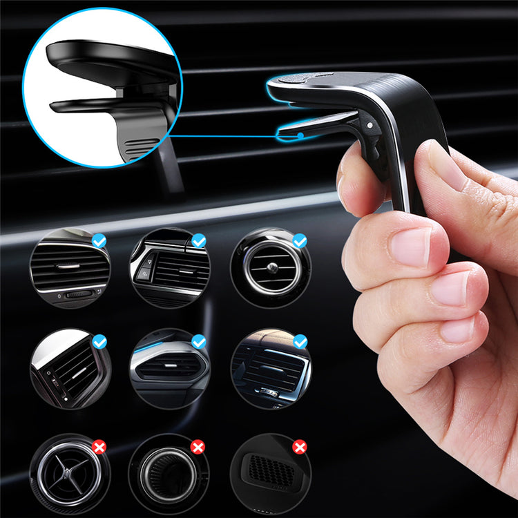Magnetic car air vent phone holder clipped to vent