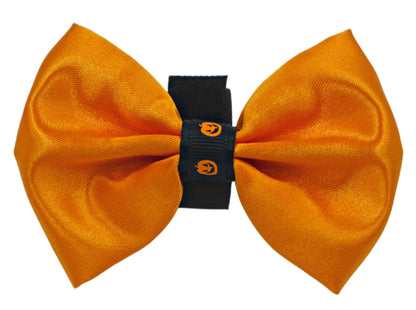 Satin Halloween dog bow with pumpkin trim, size 2, close-up