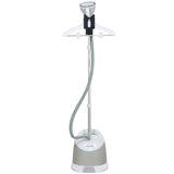 Garment steamer steaming a hanging suit