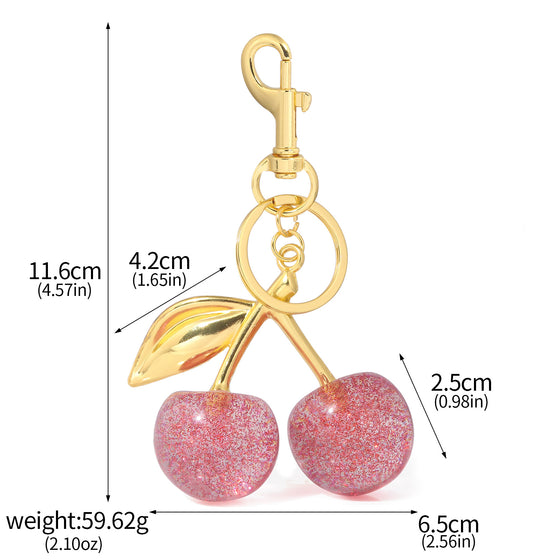 Pink glitter cherry keychain with gold leaf and size markings