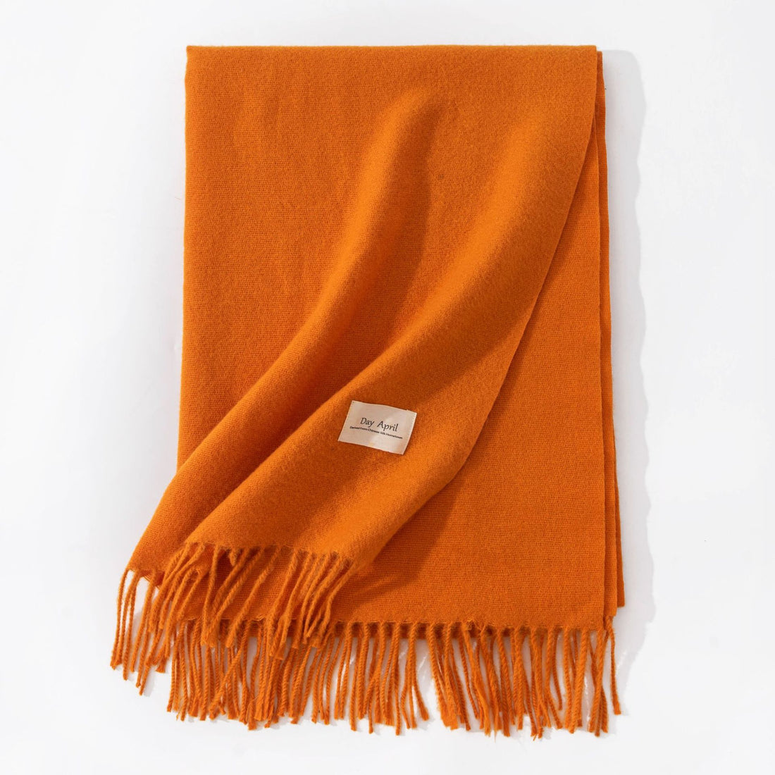 Pumpkin Yellow (orange) faux cashmere scarf with tassels, folded